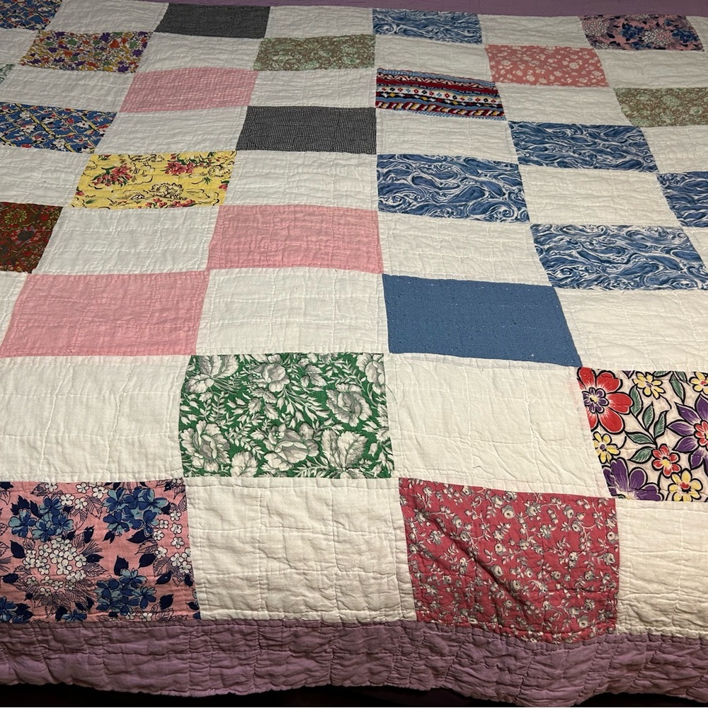 Handmade quilt. Beautiful design. Well loved and machine washed. Size Twin.